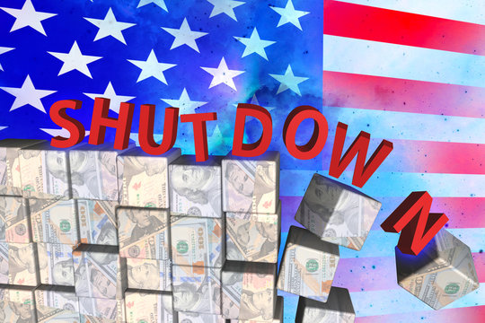 Text "SHUT DOWN" movment on cube that have picture dollar on surface and background American flag.