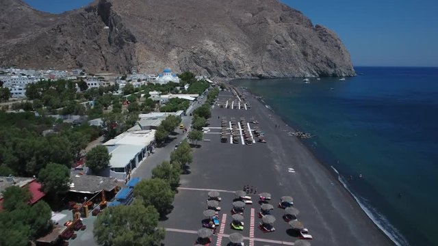 4K Drone Shot Of The Black Beach On Santorini Island, Greece