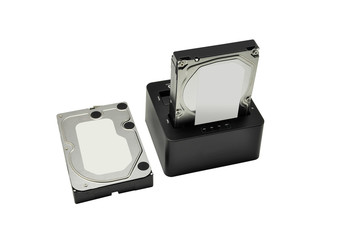 Obraz premium Docking station for hard disk and hard disk isolated on white background. Included clipping path