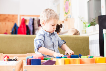 Boy playing with cubes