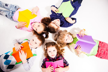 The cute children with books 