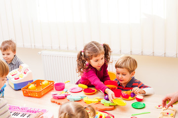 Naklejka premium Children playing cooks