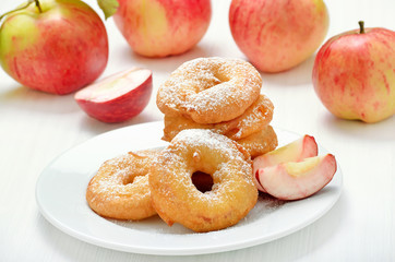 Naklejka na ściany i meble Donuts with apple slices