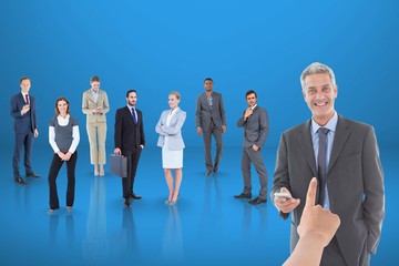 Hand choosing a business man on blue background with business