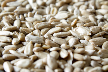 Peeled sunflower seeds background