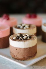 Creamy cakes with coffie at restaurant.