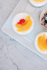 top view of creamy cakes at restaurant.