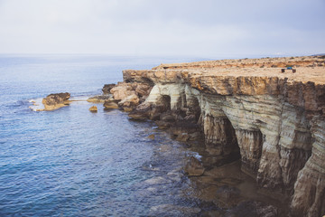 Fototapeta na wymiar Ayia Napa, Cyprus. Sea caves of Cavo Greco Cape.