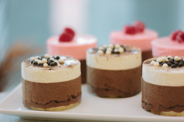 Creamy cakes with coffie at restaurant.