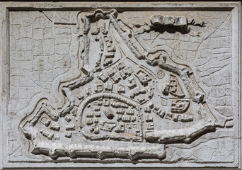 Ancient map of Padua city with old walls, from a stone relief on Santa Maria del Giglio Church in Venice, completed in the 17th century