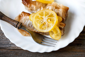 Dessert baklava on a white plate