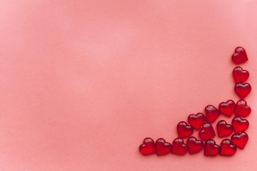 Symbols in the form of hearts on a red background.
