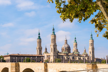 Obraz premium The Cathedral-Basilica of Our Lady of Pillar - a roman catholic church, Zaragoza, Spain. Copy space for text.