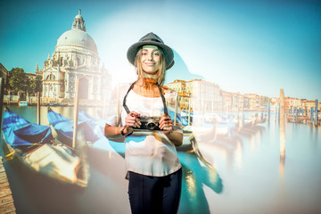 Portrait of a young woman traveler with projected image of landscape view on Venice city in Italy