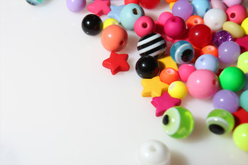 colorful beads on white background