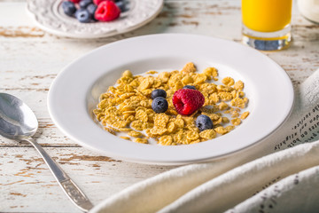 cereals with milk orange juice berries morning clock