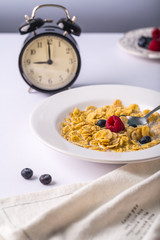 cereals with milk orange juice berries morning clock