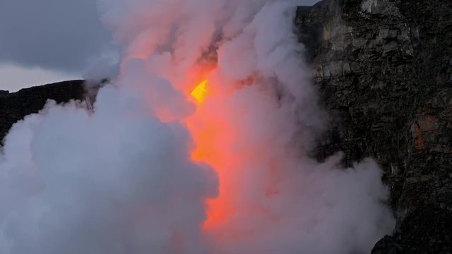 Lava from the Kīlauea volcano flows into the ocean on the Big Island of Hawaii