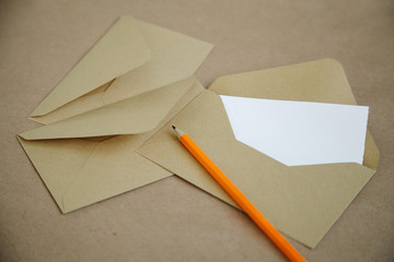 Vintage background and blank letter with a yellow pencil.