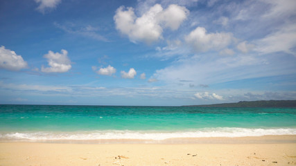 Fototapeta na wymiar Beach, sea, sand,wave. Tropical beach, blue sky, clouds. Seascape ocean and beautiful beach paradise. Philippines Boracay Travel concept
