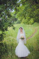 Loving wedding couple outdoor.