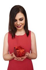 Beauty Young Girl with Valentine gift box in hand isolated on white background