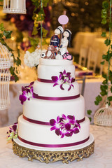 decorated wedding cake in the event room