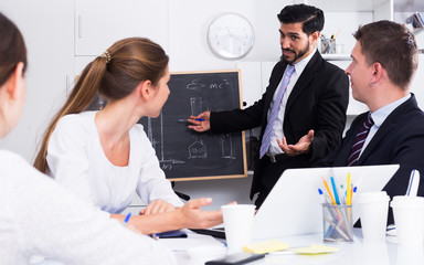 Businessman presenting strategy to partners