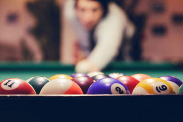 Woman and Billiard Pool Table with balls