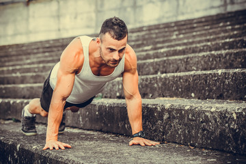 Fototapeta premium Doing a push up outdoor
