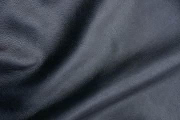чёрная кожаная текстура из части куртки - obrazy, fototapety, plakaty