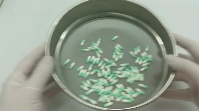 Capsules compounding in a pharmacy laboratory
