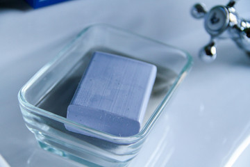 blue soap on a dish on sink