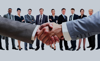handshake on the background group of business people.