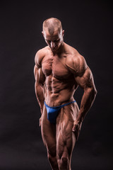 young bodybuider posing