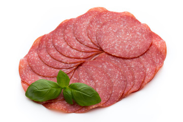 Salami slices isolated on white background.