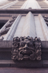 Stone face decoration on the old Chicago building