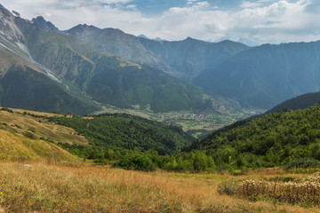 Fototapeta na wymiar Small village between mountains