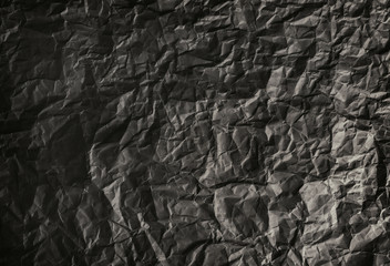 Crumpled paper background vignette. texture of crumpled  paper.