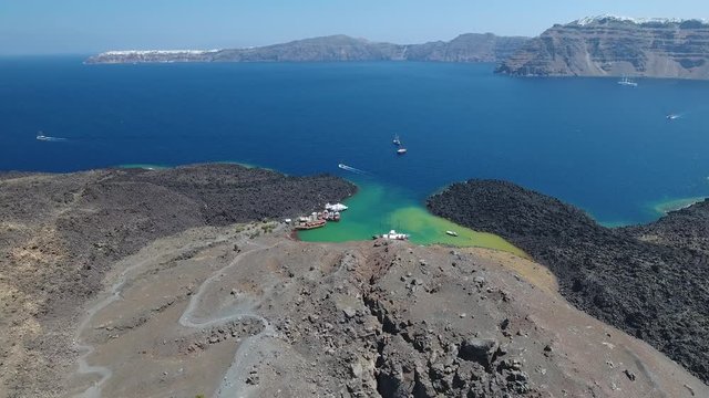 4K Drone Shot Of The Volcanic Nea Kameni Island Near Santorini, Greece