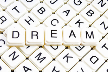 Dream text word crossword title caption label cover background. Alphabet letter toy blocks. White...