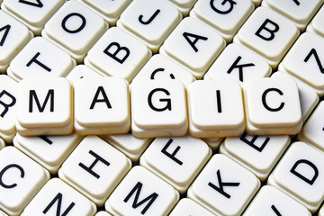 Magic text word crossword title caption label cover background. Alphabet letter toy blocks. White alphabetical letters.