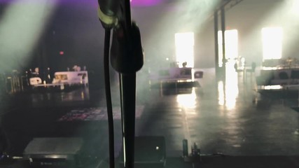 Cool close-up of a microphone on stage before a concert. 