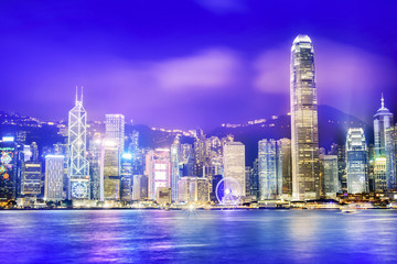 Fototapeta na wymiar Hong Kong at night. Victoria Harbour and Hong Kong Central. Taken from Avenue of Stars. Located in Hong Kong.