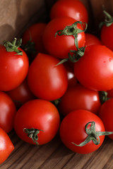 Fresh bright and juicy tomatoes on the kitchen