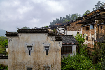 Fototapeta na wymiar Huang ling village in Wuyuan, with typical traditional Hui homes. Wuyuan County is famous for the yellow rapeseed flowers in spring and is considered one of the most beautiful rural locations of China