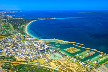 Obraz premium Aerial view of Fremantle Harbour, the Western Australia's largest and busiest general cargo port. Scenic flight over Fishing Boat Harbour, near Perth in Australia.