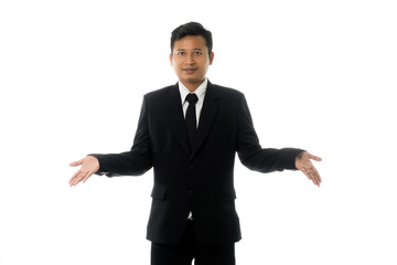 Portrait of an asian business man in a pose I do not know. Isolated on white background