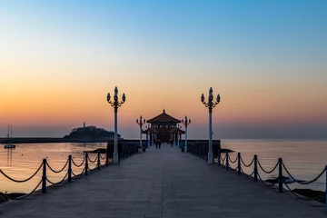 Papier Peint photo Lavable Ville sur leau Zhanqiao pier at sunrise, Qingdao, Shandong, China