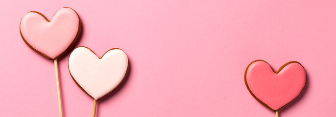 Gingerbread hearts isolated on pink background